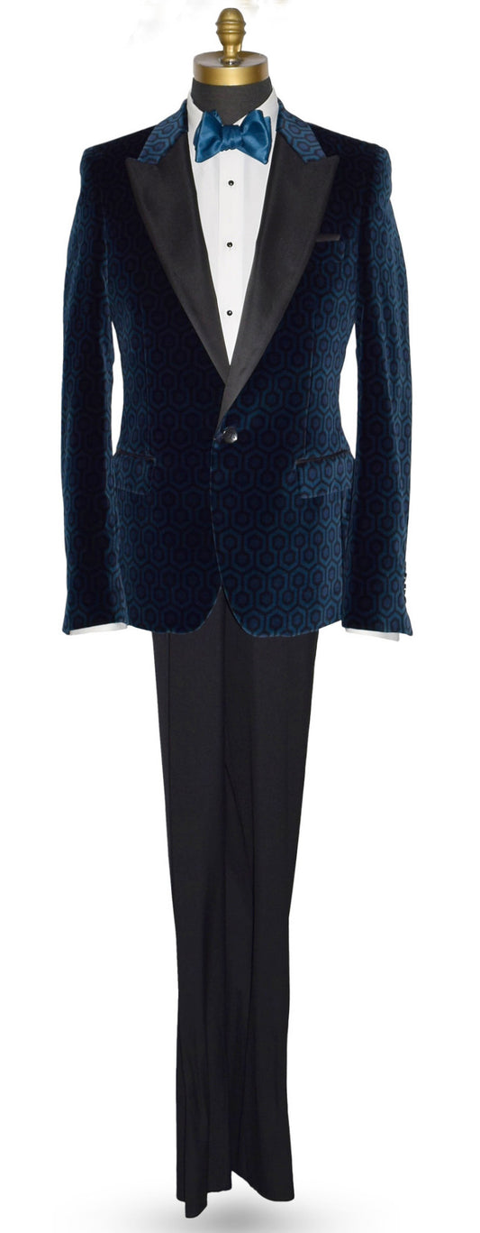 life size mannequin wearing a blue velvet tuxedo jacket with a white tuxedo shirt and blue tie-yourself bowtie against a white bakground