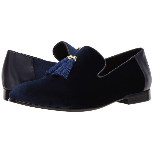 blue velvet men's slip-on shoes with tassels against a white background