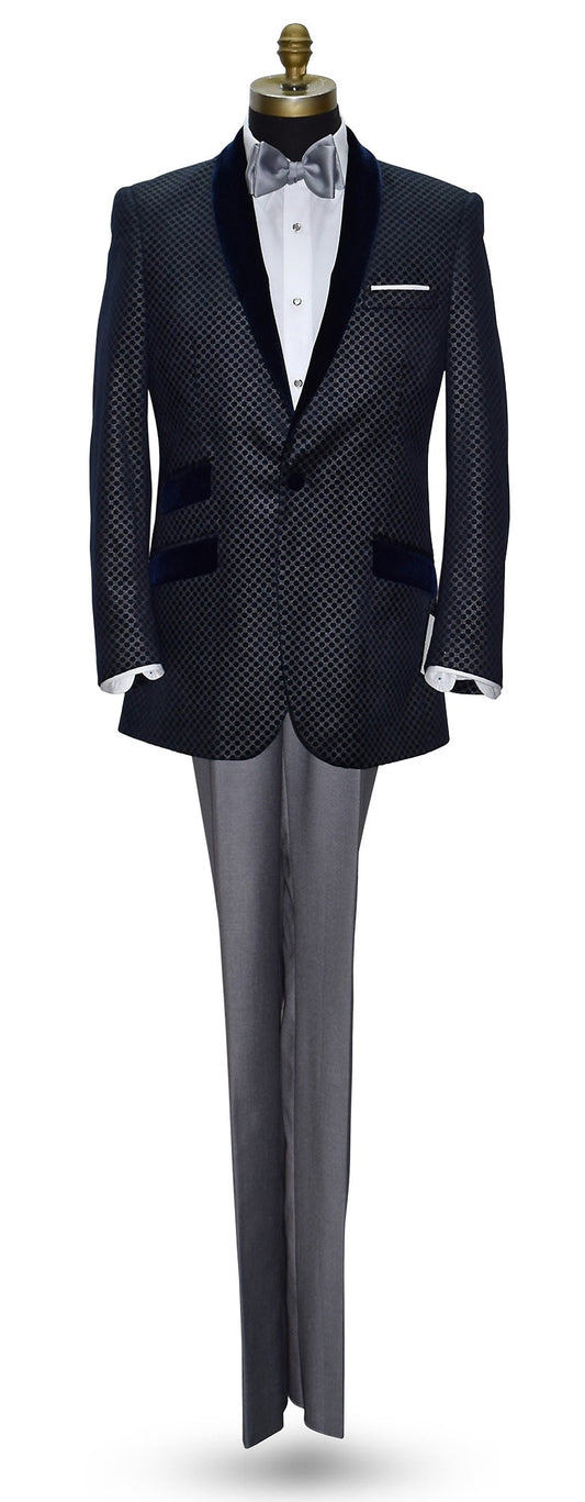 blue velvet dinner jacket with silver pattern on a mannequin with gray pants and gray bowtie