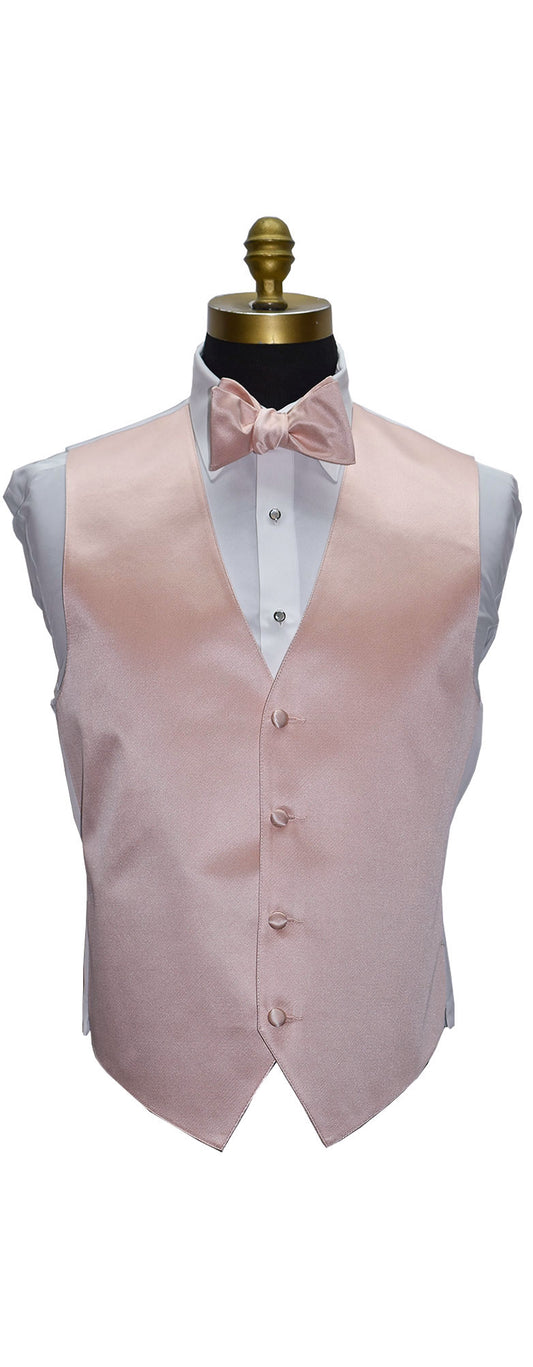 Blush color vest and blush "tie-yourself" bow tie on a mannequin against a white background