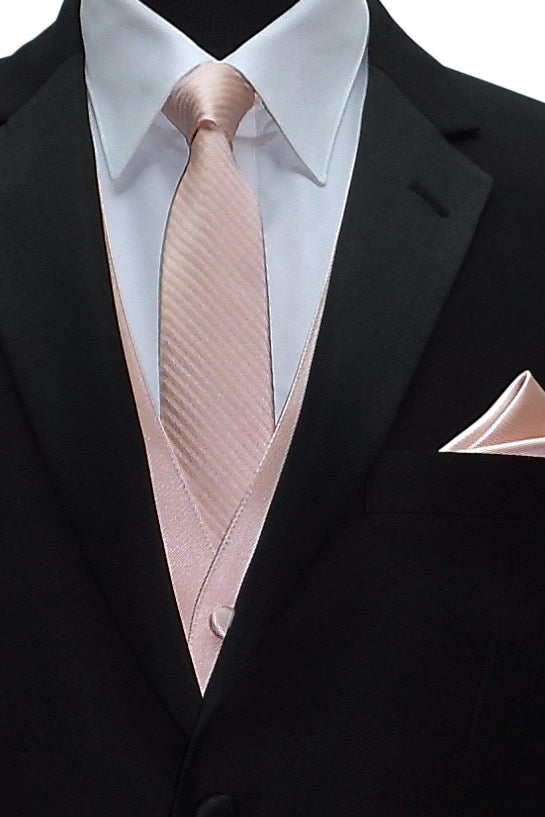 close-up black suit with a white dress shirt with a blush tuxedo vest and blush striped necktie against a white background 
