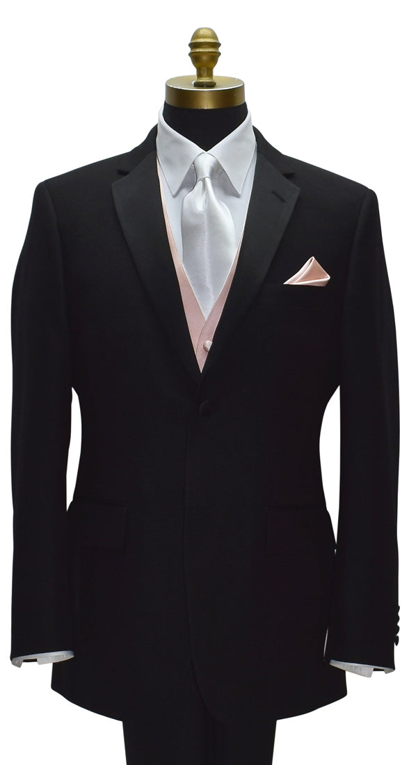 Black notch tuxedo with white shirt and blush tuxedo vest with a white satin necktie on a mannequin against a white background