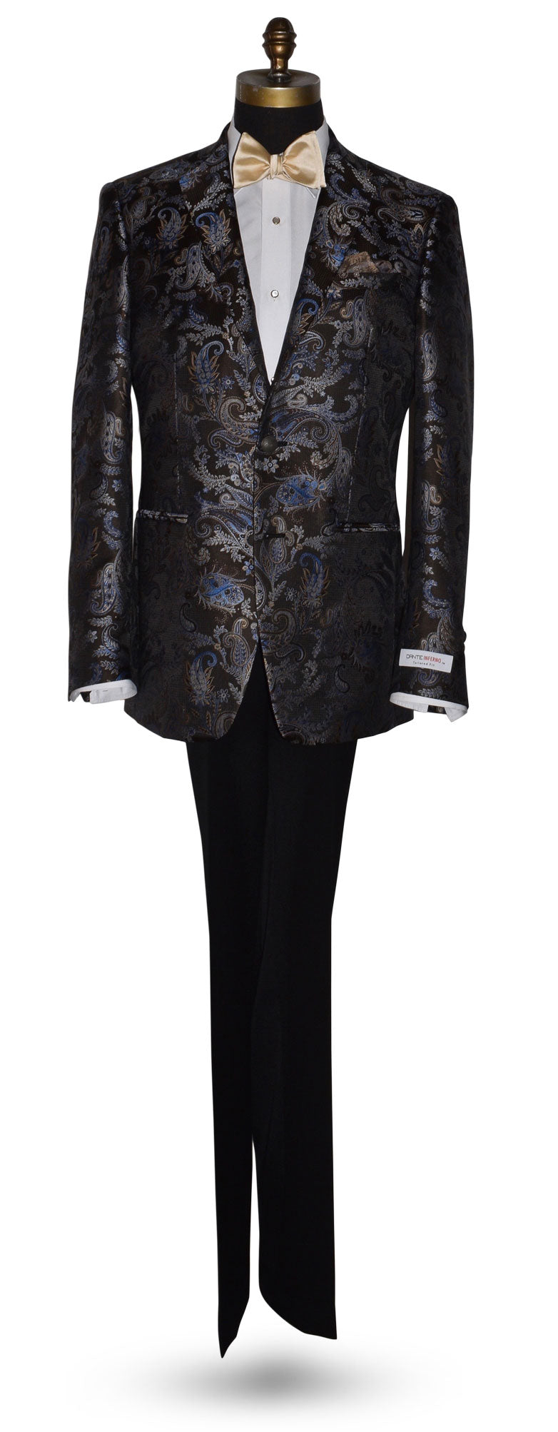 life size mannequin wearing a brown dinner jacket with blue paisley pattern with an ivory "tie-yourself" bowtie against a white background 