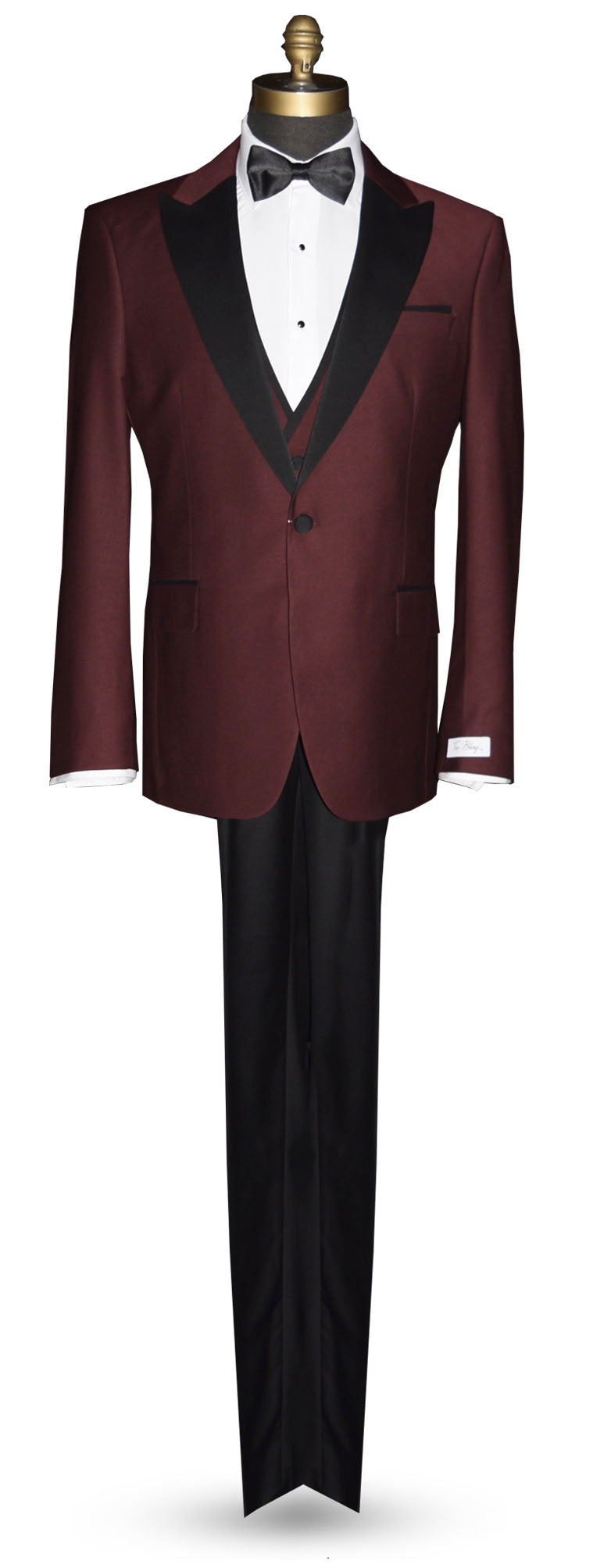 life size mannequin wearing burgundy 3 piece tuxedo with black lapels on a mannequin against a white background