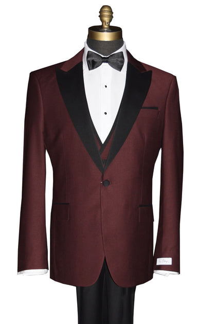 close-up burgundy 3 piece tuxedo with black lapels on a mannequin against a white background