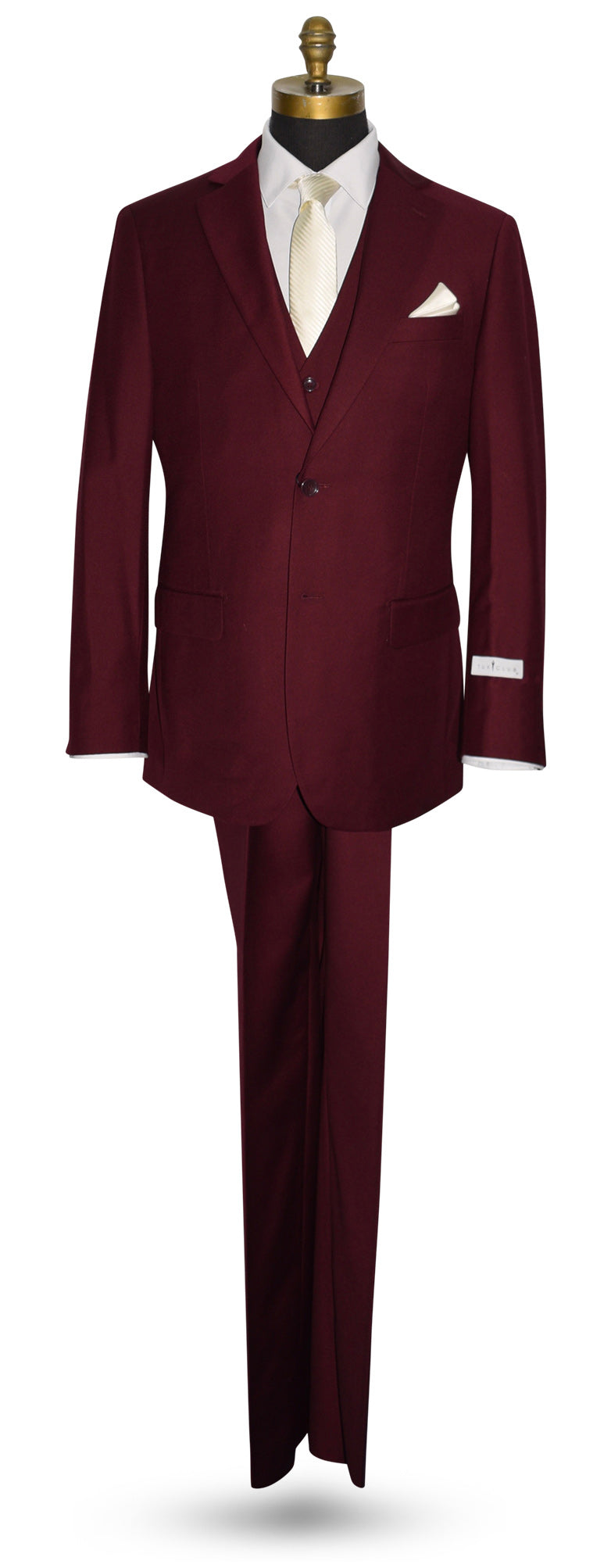 Burgundy 3-suit on a mannequin with a white shirt and ivory necktie and pocket square against a white background