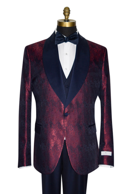 close-up  mannequin wearing a burgundy dinner jacket with navy blue lapel and navy blue paisley design with black pants against a white background