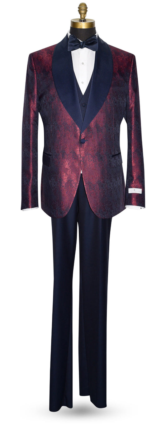 life size mannequin wearing a burgundy dinner jacket with navy blue lapel and navy blue paisley design with black pants against a white background