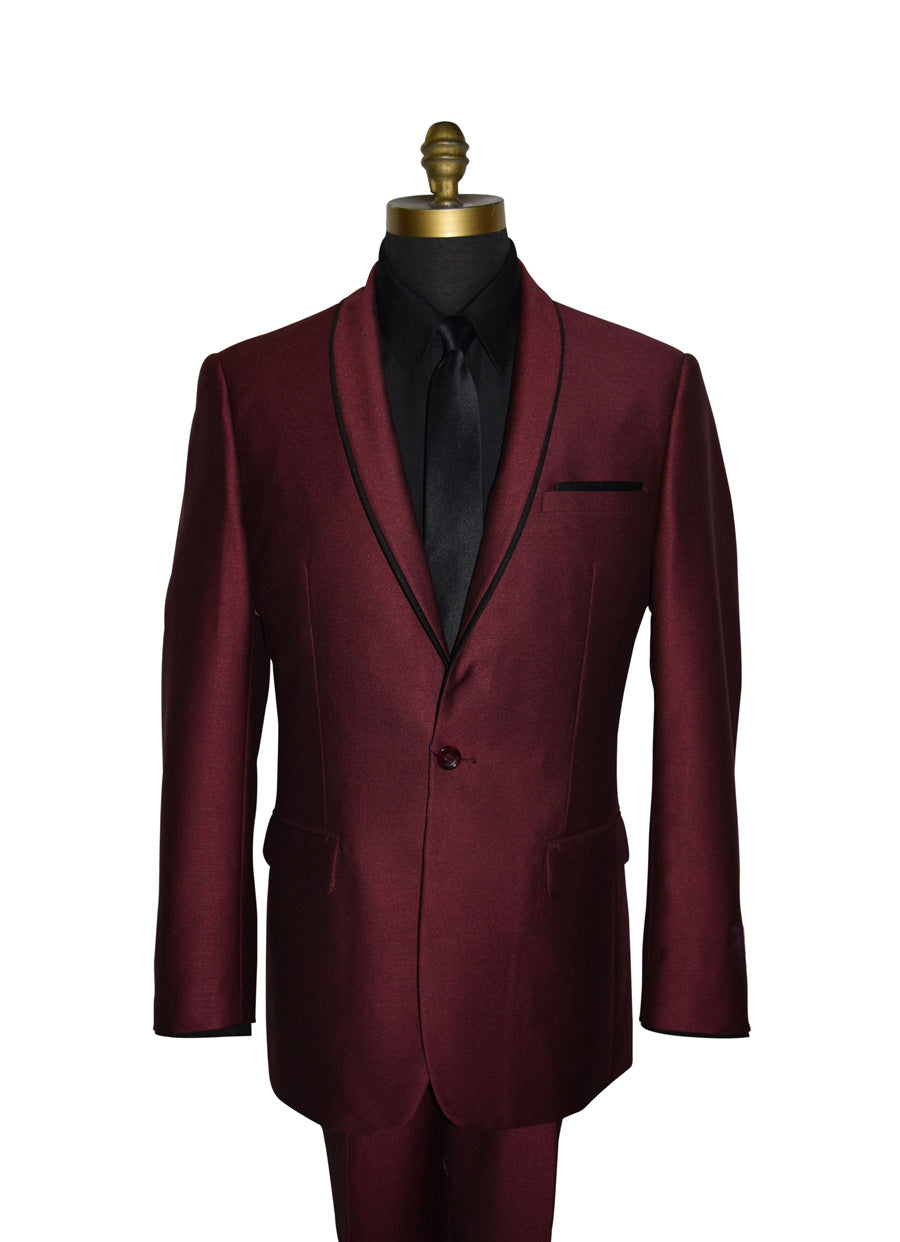 close-up Burgundy shawl collar tuxedo with a black shirt and long black necktie on a mannequin against a white background
