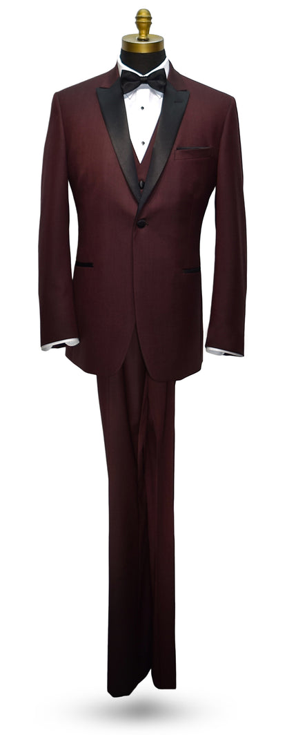 life size mannequin wearing a burgundy tuxedo with black lapels and burgundy vest with a black satin bowtie on a mannequin against a white background