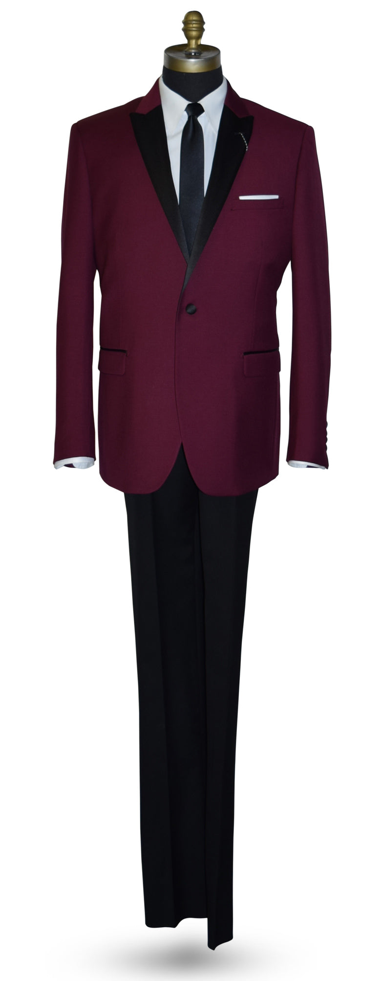 Burgundy tuxedo with black lapels on a mannequin wearing black tuxedo pants and a long black skinny necktie against a white background