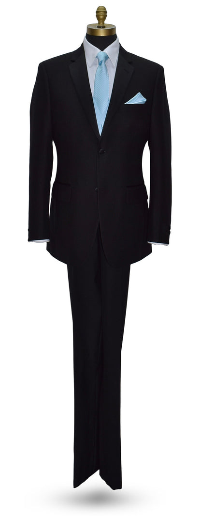 life-size mannequin wearing a black tuxedo with a capri-blue tuxedo vest and capri-blue striped necktie and pocket handkerchief against a white background