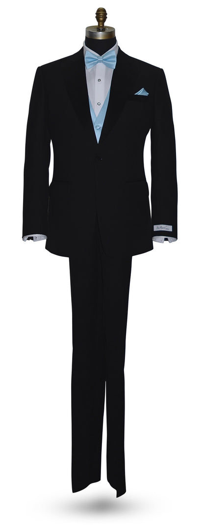 full size mannequin wearing a "San Miguel Especial" black peak-lapel tuxedo with a white dress shirt and a capri-blue tuxedo vest and  capri-blue "pre-tied" bowtie and pocket handkerchief against a white background
