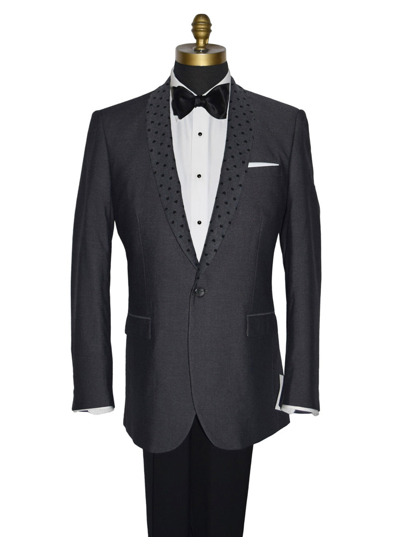mannequin wearing a charcoal gray dinner jacket with a white tuxedo shirt and black tie-yourself bowtie against a white background
