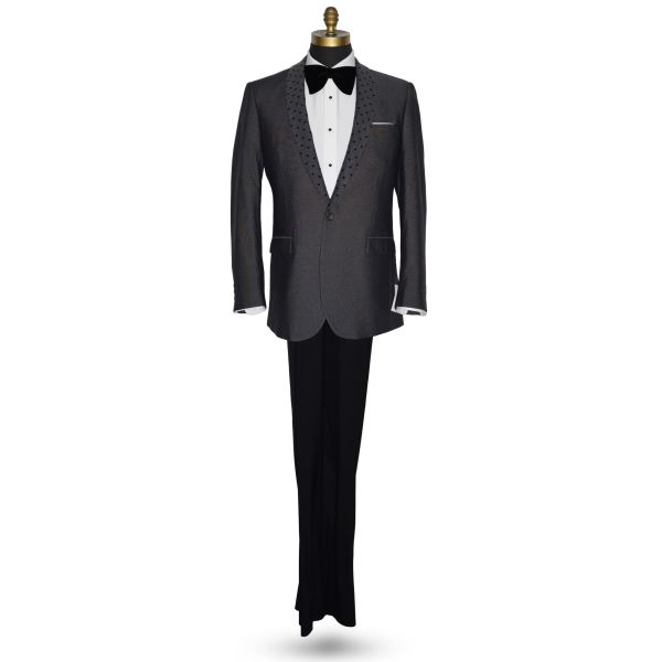 life size mannequin wearing a charcoal gray dinner jacket with a white shirt and larger black velvet bow tie on a mannequin against a white background