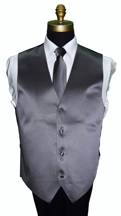 Charcoal gray tuxedo vest with a charcoal necktie with subtle stripe on a mannequin against a white background