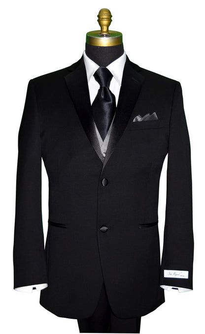 Black "San Miguel Especial" wedding suit on a mannequin with a white shirt and long black silk necktie with a charcoal tuxedo vest against a white background