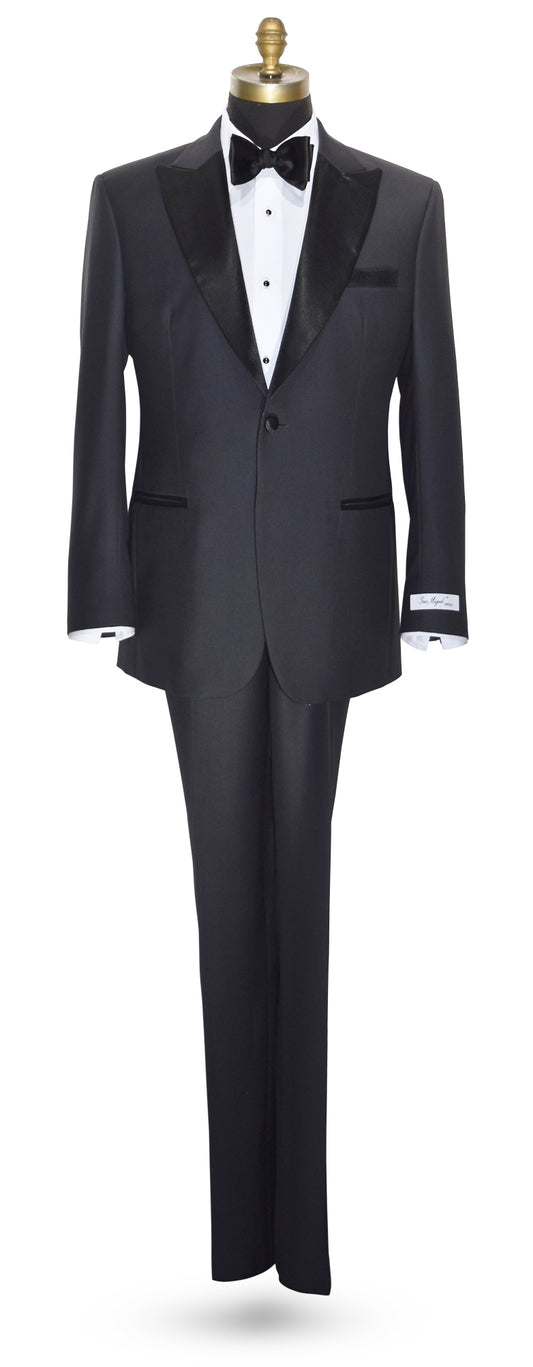 life size mannequin wearing charcoal peak lapel tuxedo with white tuxedo shirt and black bowtie