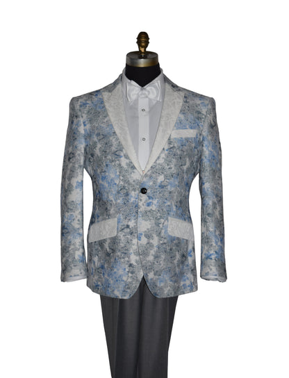 close-up blue and gray floral-patterned tuxedo jacket with a white bowtie and gray pants on a mannequin against a white background