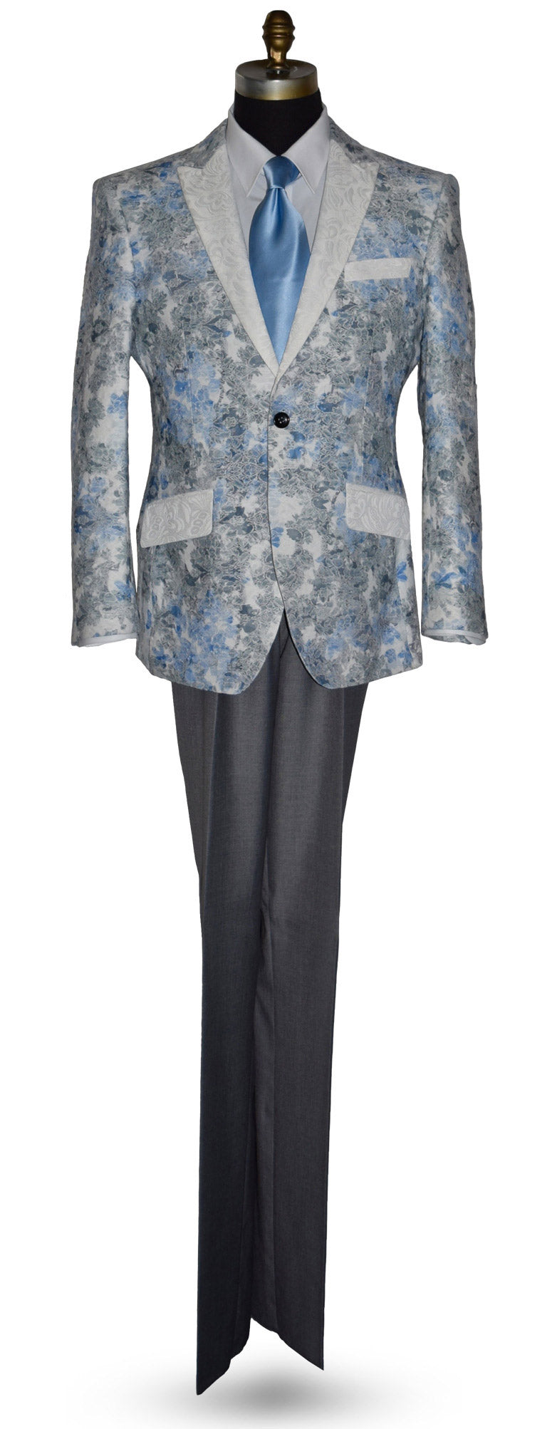 blue and gray floral-patterned tuxedo jacket with baby blue necktie and gray pants on a mannequin against a white background