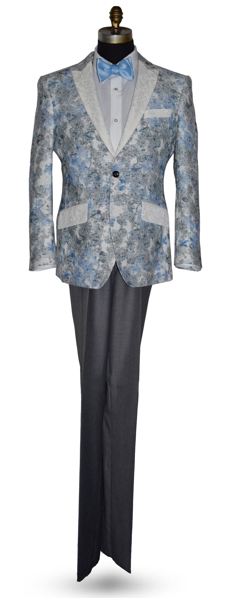 blue and gray-Floral-patterned tuxedo jacket with a baby blue bowtie and gray pants on a mannequin against a white background