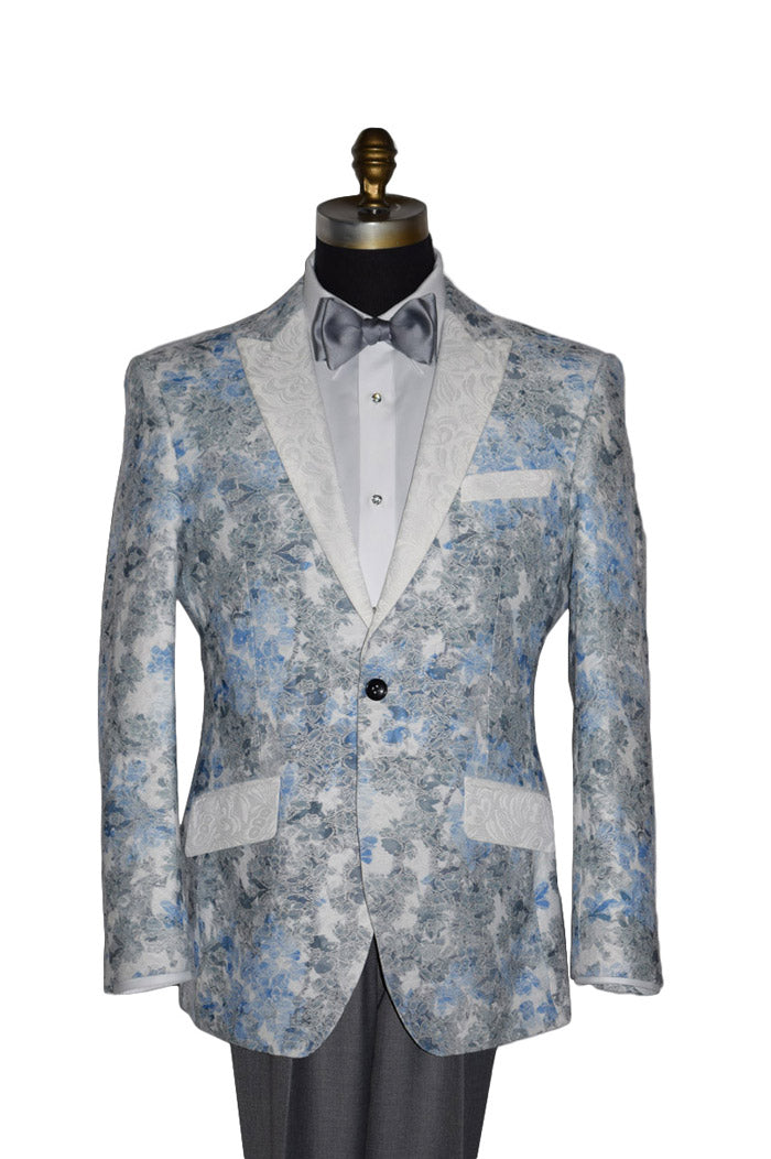 Floral patterned blue and gray tuxedo on a mannequin with a white background