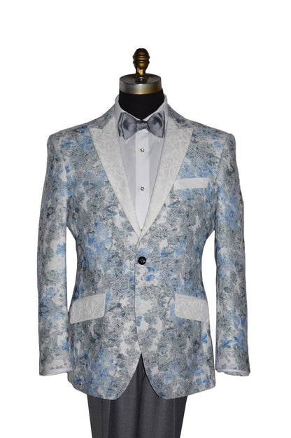 Floral patterned blue and gray tuxedo on a mannequin with a white background