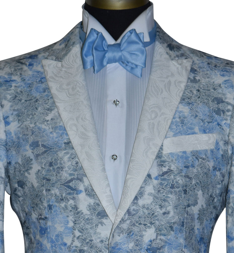 close-up Blue and gray tuxedo with a blue tie-yourself bow tie and crystal studs and cufflinks on a mannequin against a white background