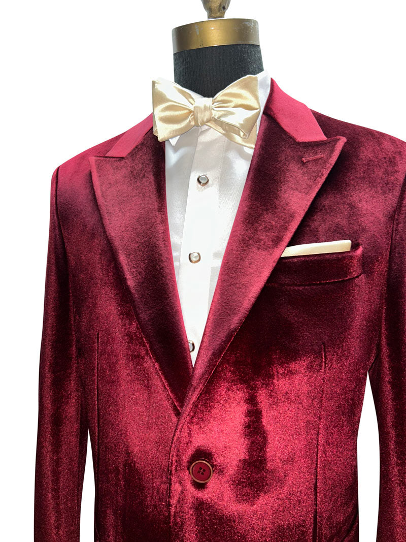 close-up burgundy red velvet dinner jacket with cream color bowtie