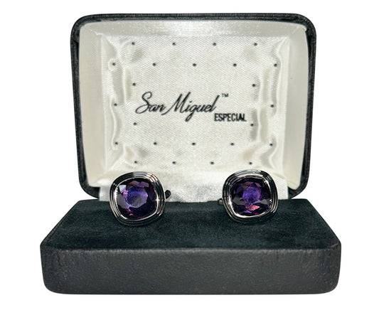 Purple gemstone cufflinks in a San Miguel box on a white background