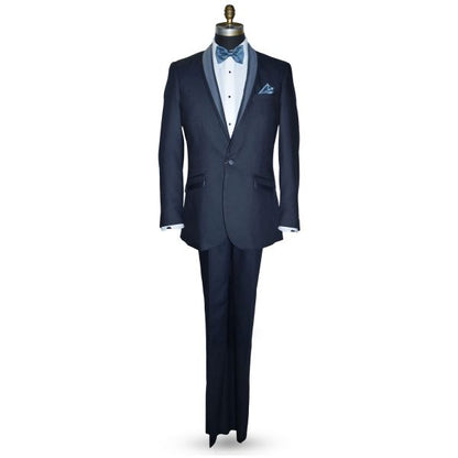 life size mannequin wearing a blue tuxedo with a serene bue "tie-yourself" bowtie against a white background