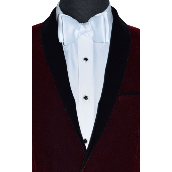 mannequin wearing  a black tuxedo with white shirt and bowtie with onyx studs and cufflinks in a silver setting with crystals