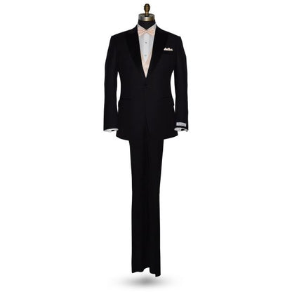life size full mannequin wearing black tuxedo with nude pre-tied bowtie and nude color vest and pocket handkerchief against a white background