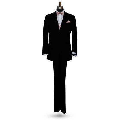 life size mannequin wearing a black tuxedo with a branded label "San Miguel Espeial" with a rose-gold "pre-tied" bowtie and matching vest against a white background