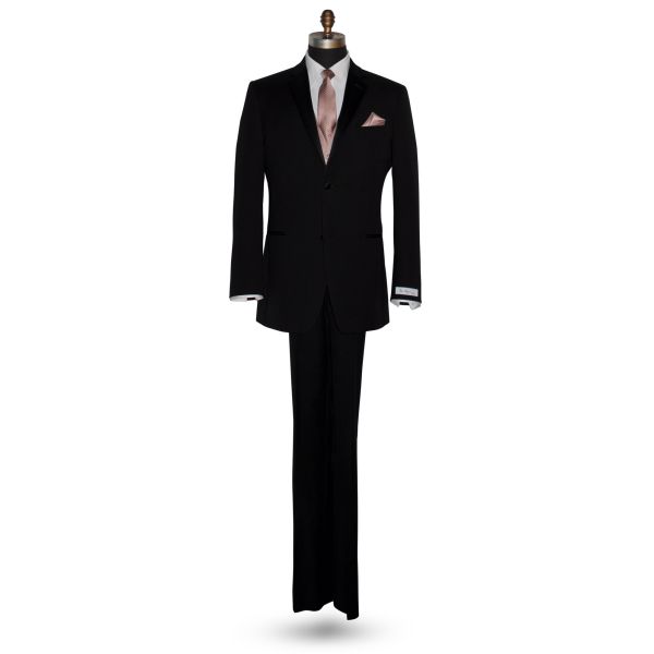life-size mannequin wearing a black wedding suit with a white dress shirt and a rose-gold tuxedo vest with a rose-gold long necktie with subtle stipe against a white background