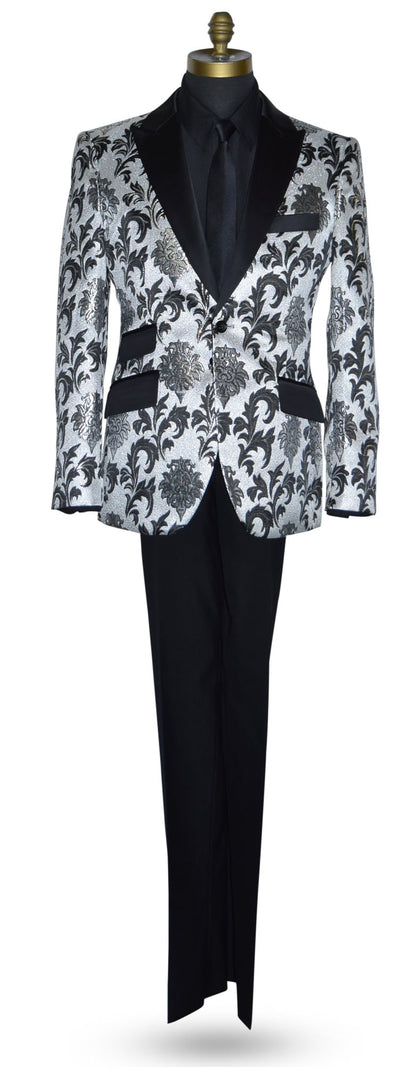 Silver and black tuxedo with a black shirt and black necktie on a mannequin against a whtie background