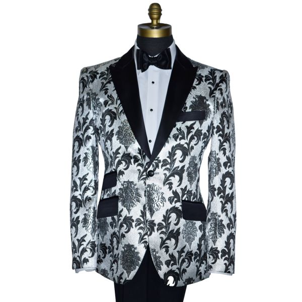 mannequin wearing a silver and black tuxedo with a black bowtie against a white background