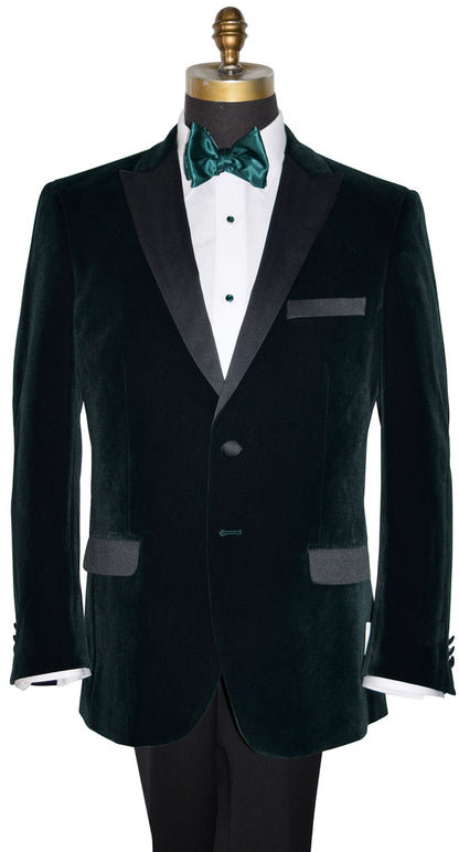 close-up mannequin wearing hunter green velvet tuxedo jacket shown with a green silk bowtie against a white background