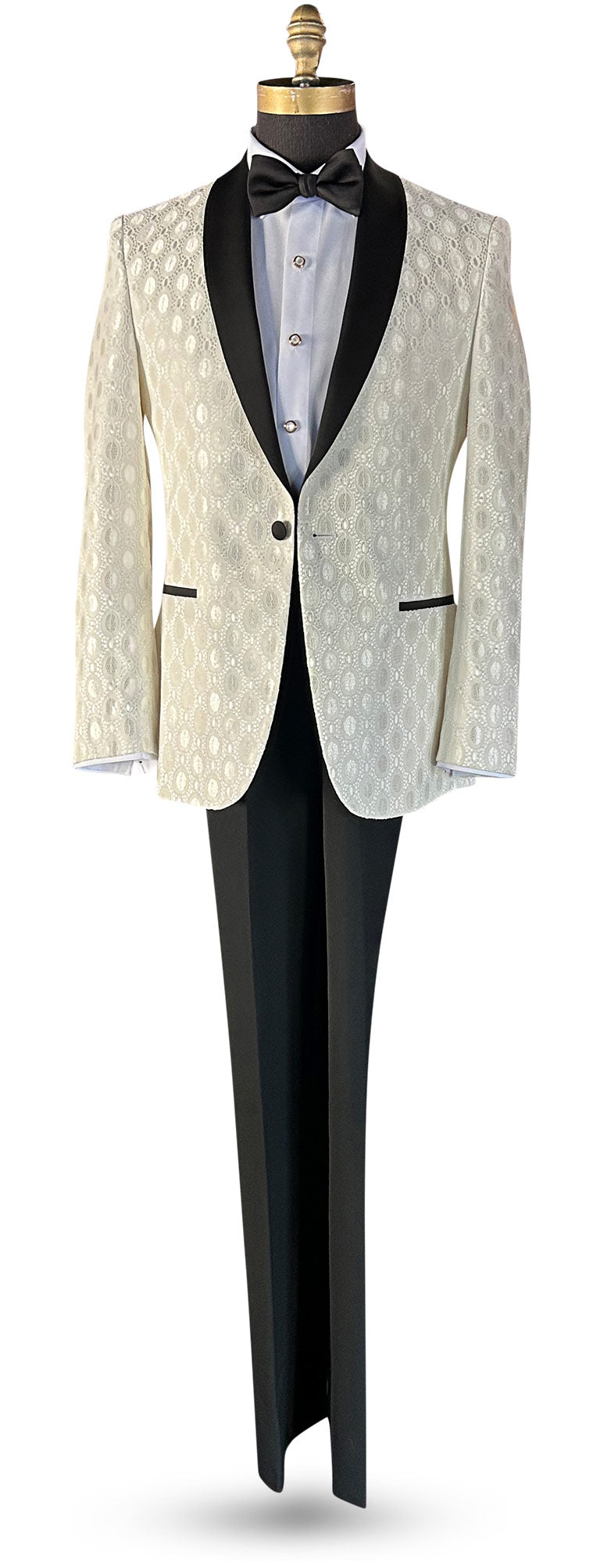 full size mannequin wearing an ivory shawl collar tuxedo with black shawl collar against a white background