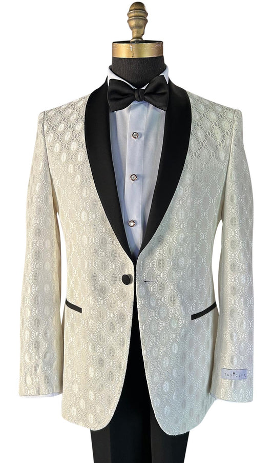 Ivory shawl collar tuxedo jacket with black lapels on a mannequin against a white background