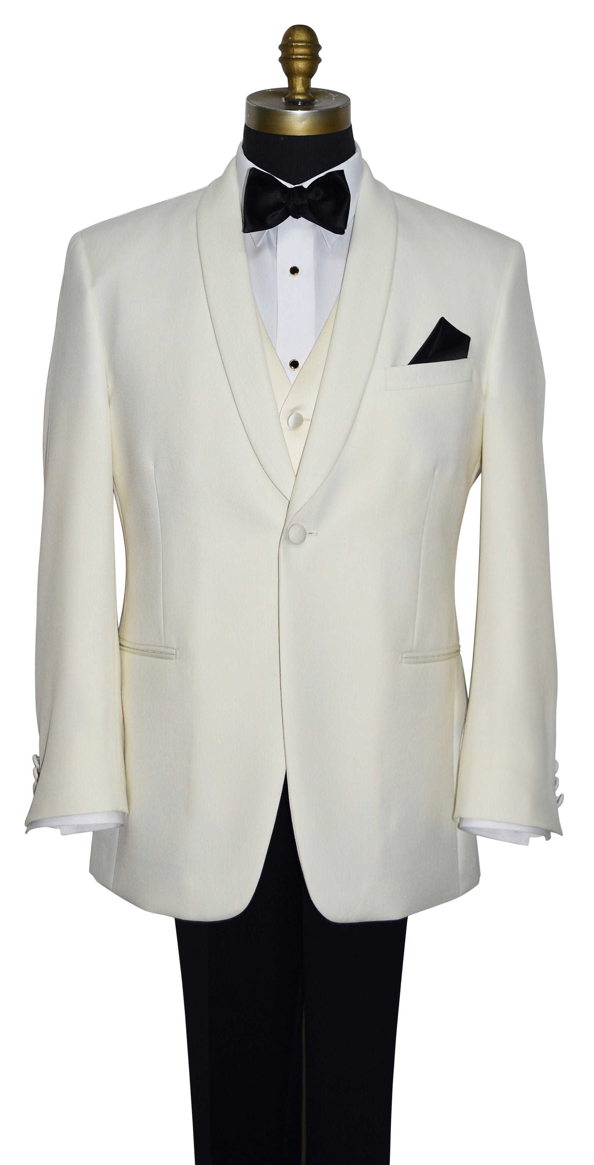close up ivory shawl collar tuxedo on a mannequin with black tuxedo pants and a ivory vest and black bowtie