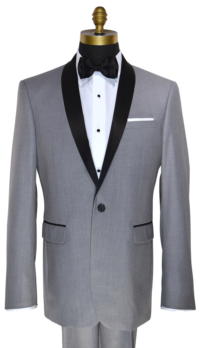 close-up mannequin wearing alight-gray shawl collar tuxedo with black bow tie on a white background