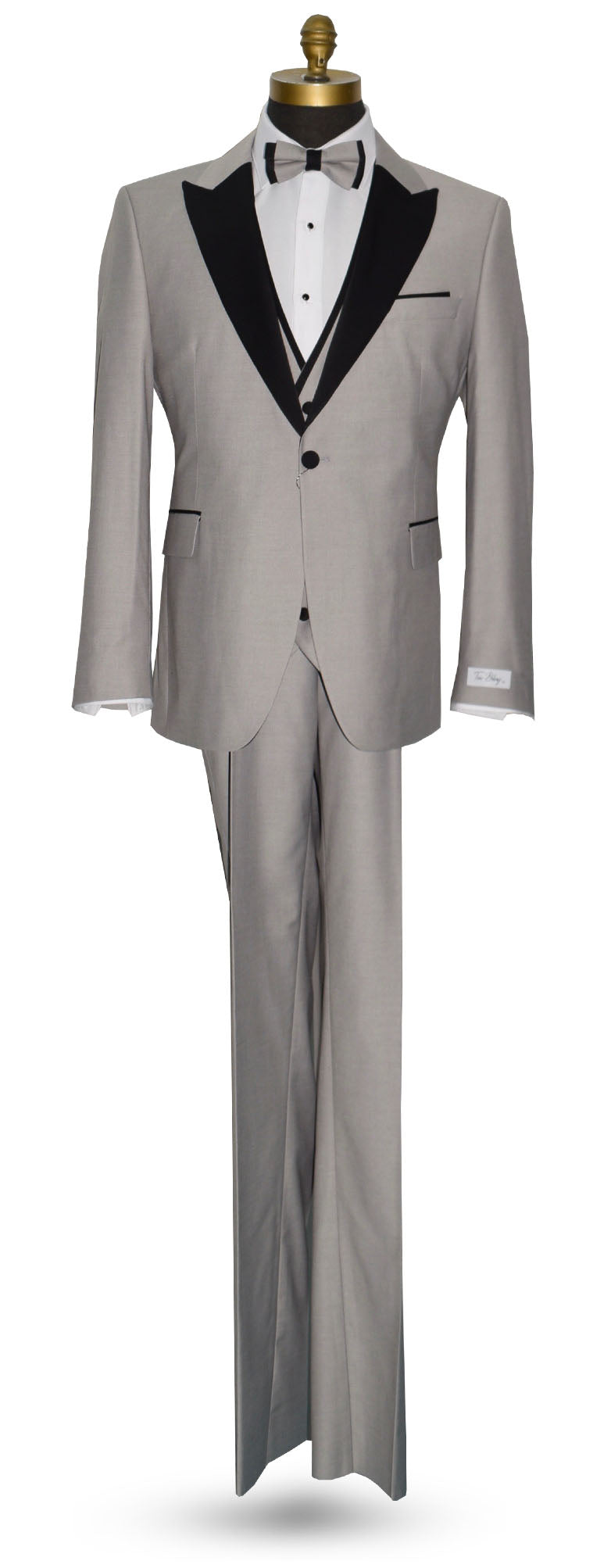 life size mannequin wearing light gray peak lapel tuxedo with matching gray vest and gray bow tie against a white background