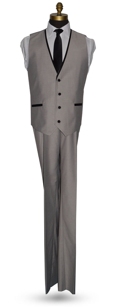 life size mannequin wearing a light gray vest and black long necktie against a white background