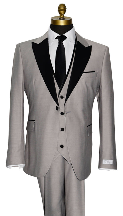 close-up light gray peak lapel tuxedo with gray vest and black long necktie against a white background