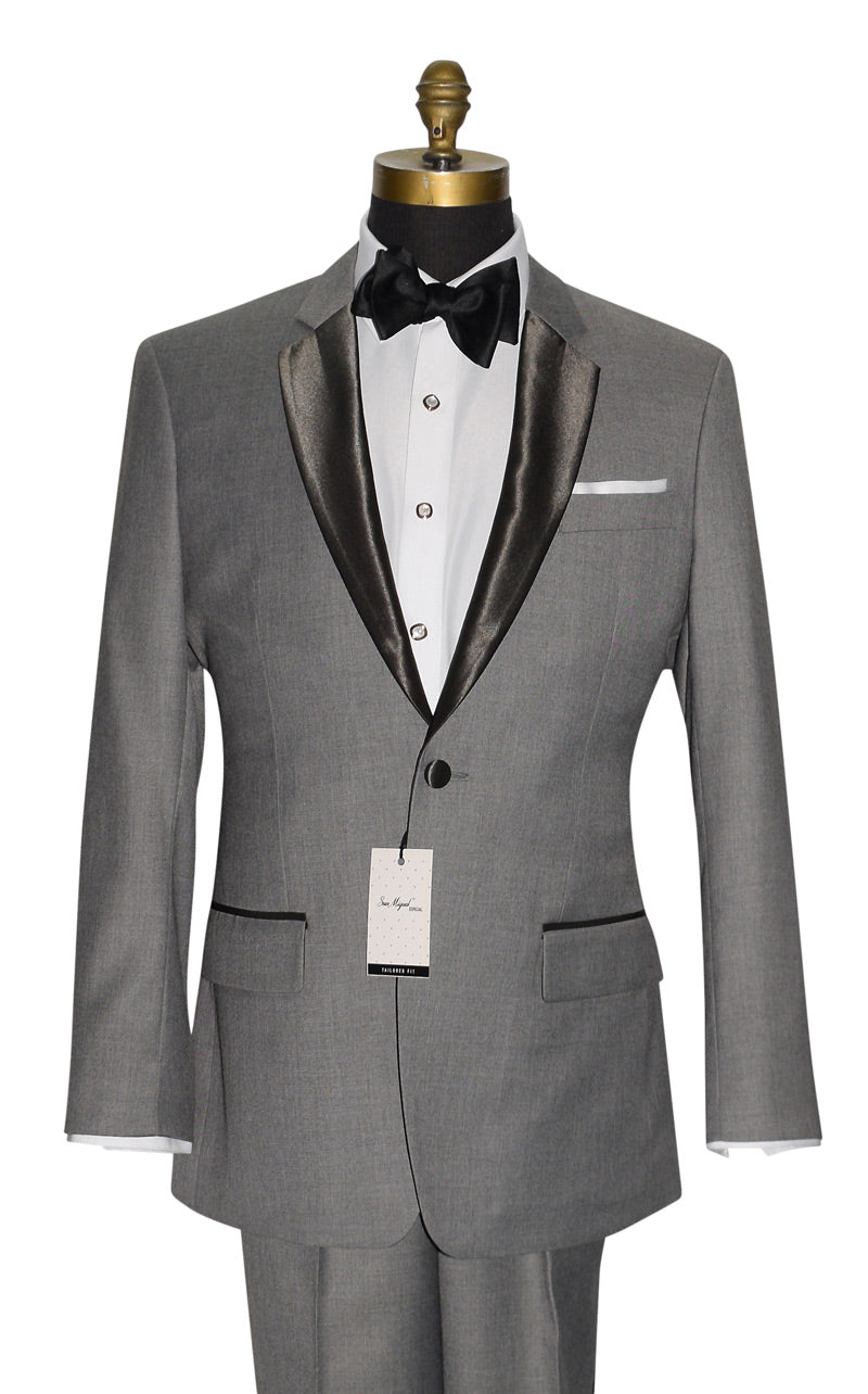 close up of a Gray tuxedo suit with charcoal lapels and a black bowtie, on a mannequin against a white background