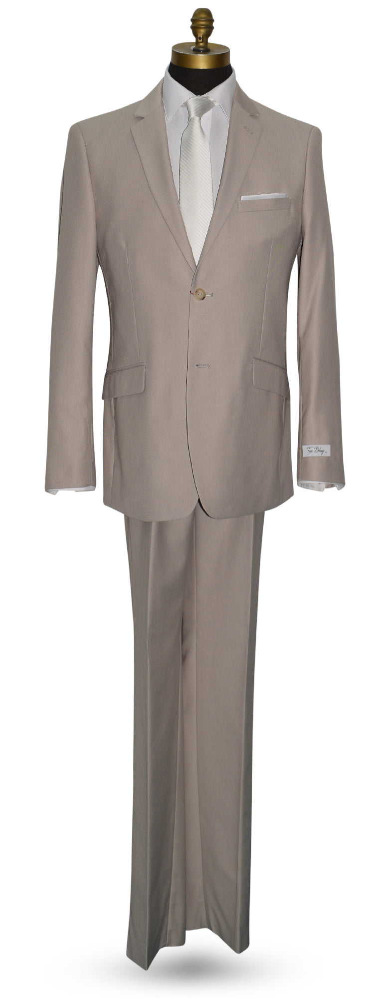 life size mannequin wearing beige mens suit with white long dress tie and "tux bling" branded label against a white background