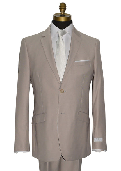 close-up mannequin wearing beige mens suit with white long dress tie and "tux bling" branded label against a white background