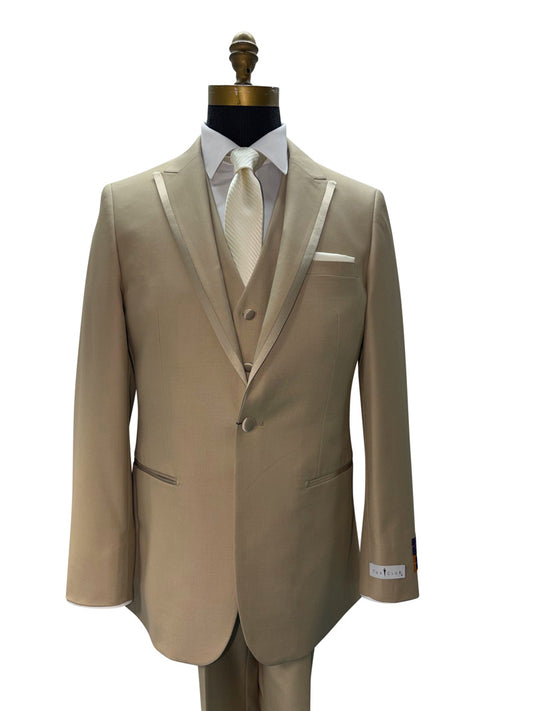 Beige mens tuxedo on a mannequin with a white shirt and tie against a white background