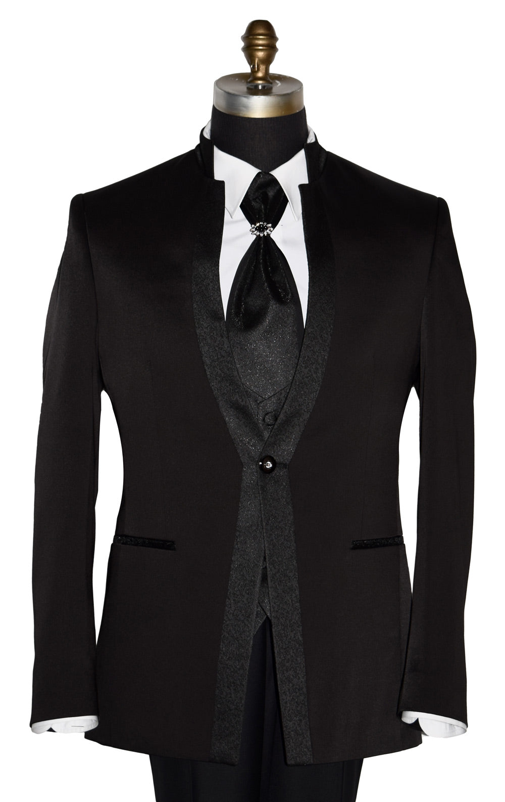 Black nehru tuxedo with vest and bow tie on a mannequin against a white background